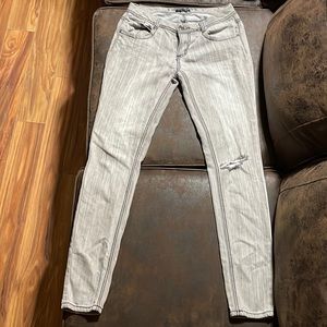 Gray jeans black flower details on the back pocket